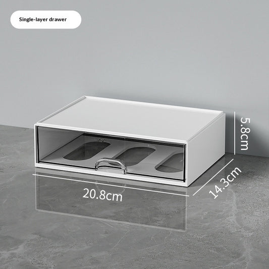 White single-layer desktop organizer with a transparent divided pull-out drawer